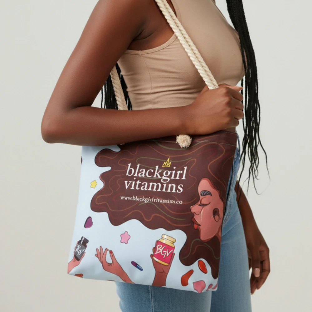 A woman carrying the BGV Limited Edition Tote on her shoulder